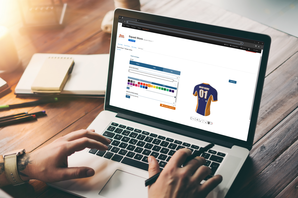 Person on laptop using Kit Builders Squad Stores, 3D Customization for team stores.
