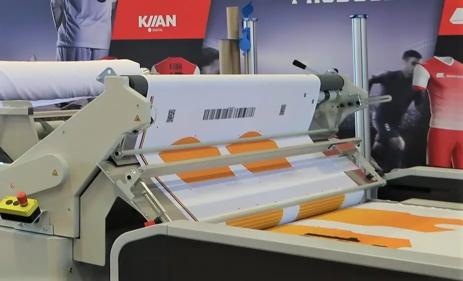 Solutions - Print production Photograph of a shirt being produced using the sublimated print process on a professional sublimation printing machine